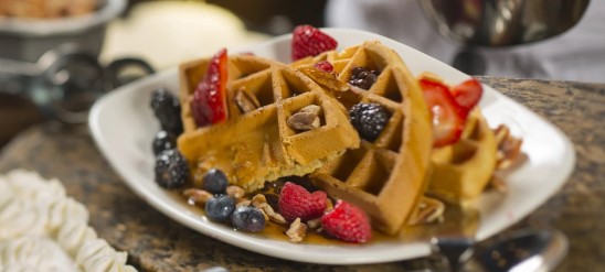 Waffles with berries on plate