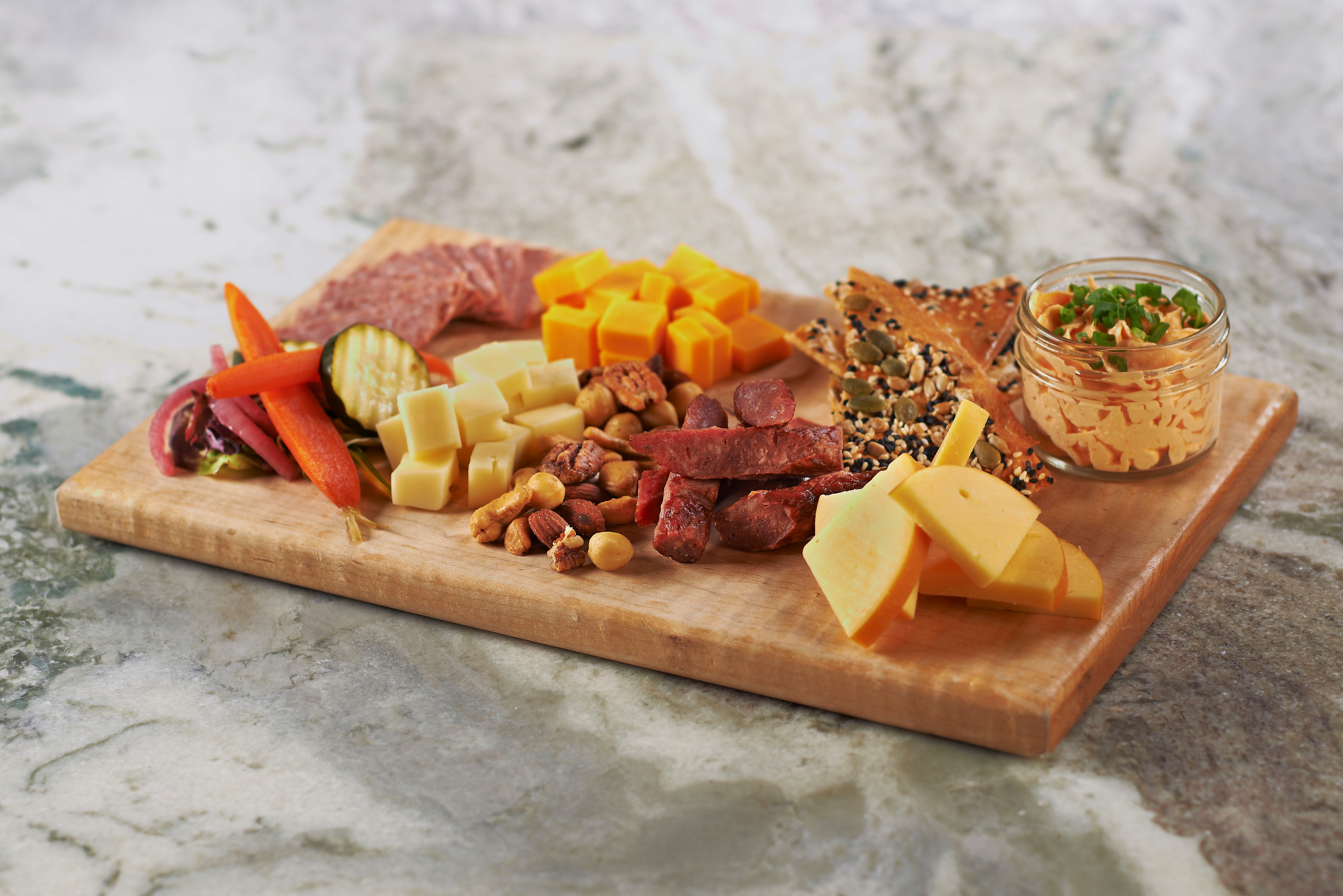 Charcuterie board with meats and cheese.