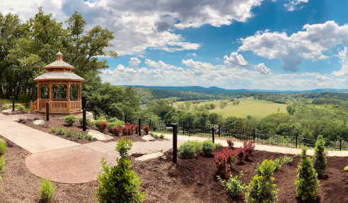 The Prayer Garden featuring a wooden gazebo and a breathtaking view of the valley below offers a unique place to worship God.